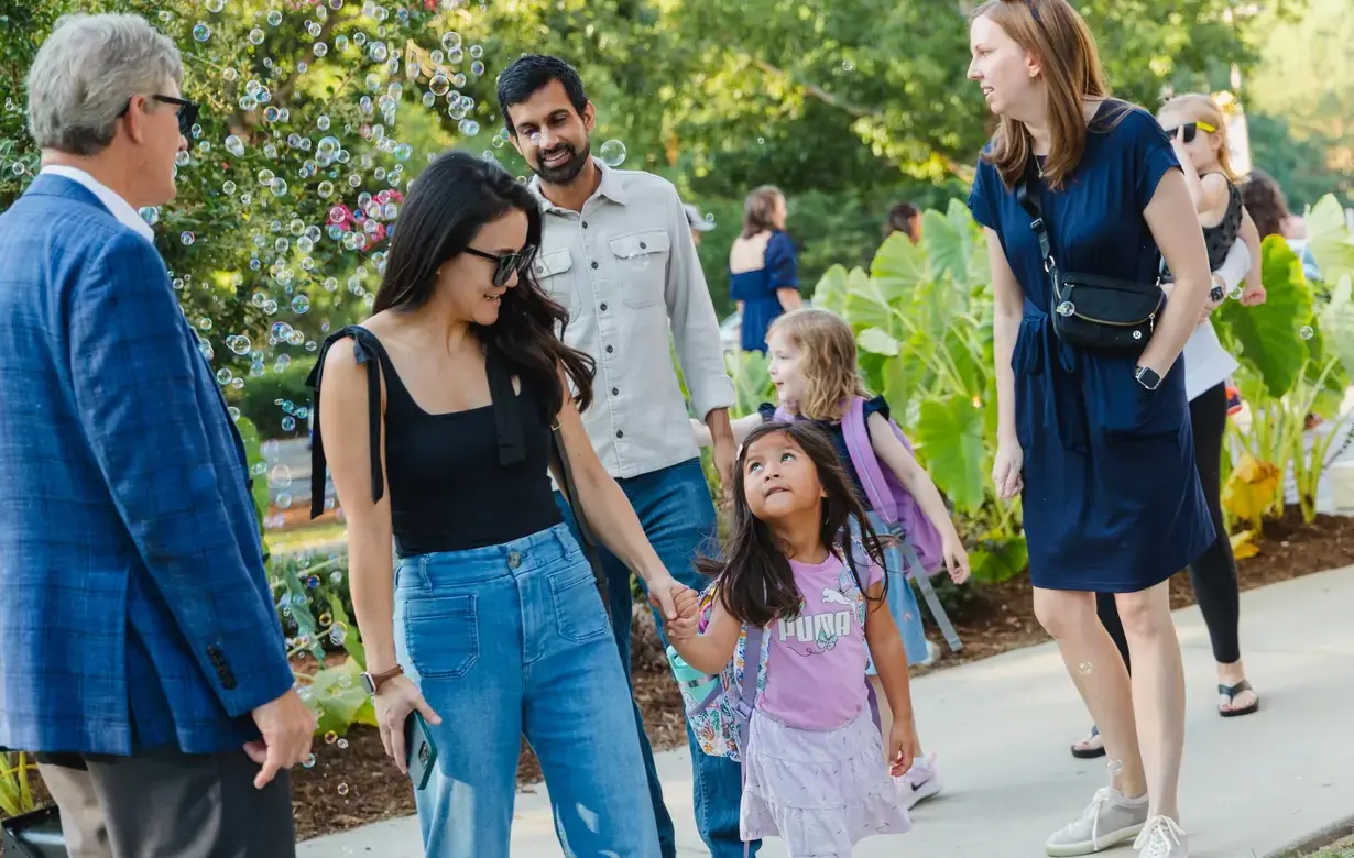 Lower school students and parents entering school