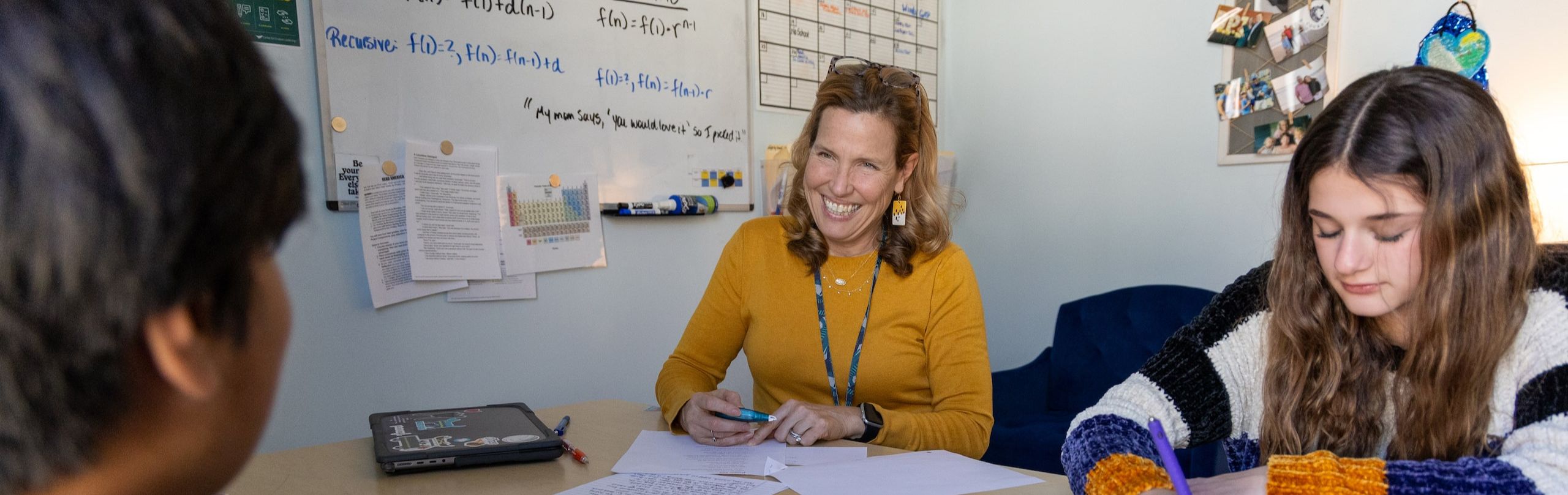 Joyful teacher with students