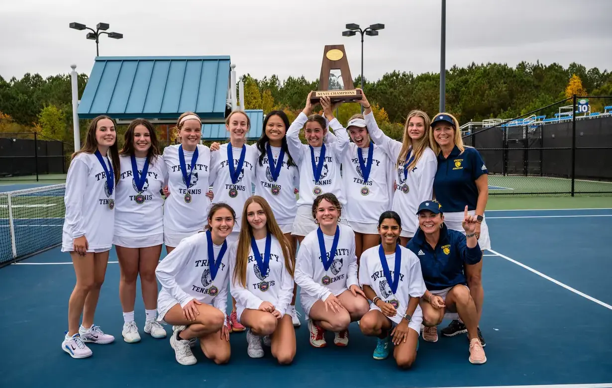 Group of female students celebrating athletic success