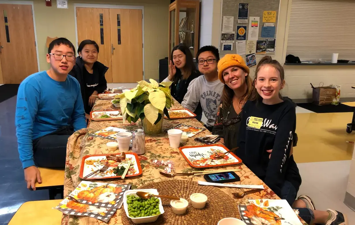 International students sharing a meal together